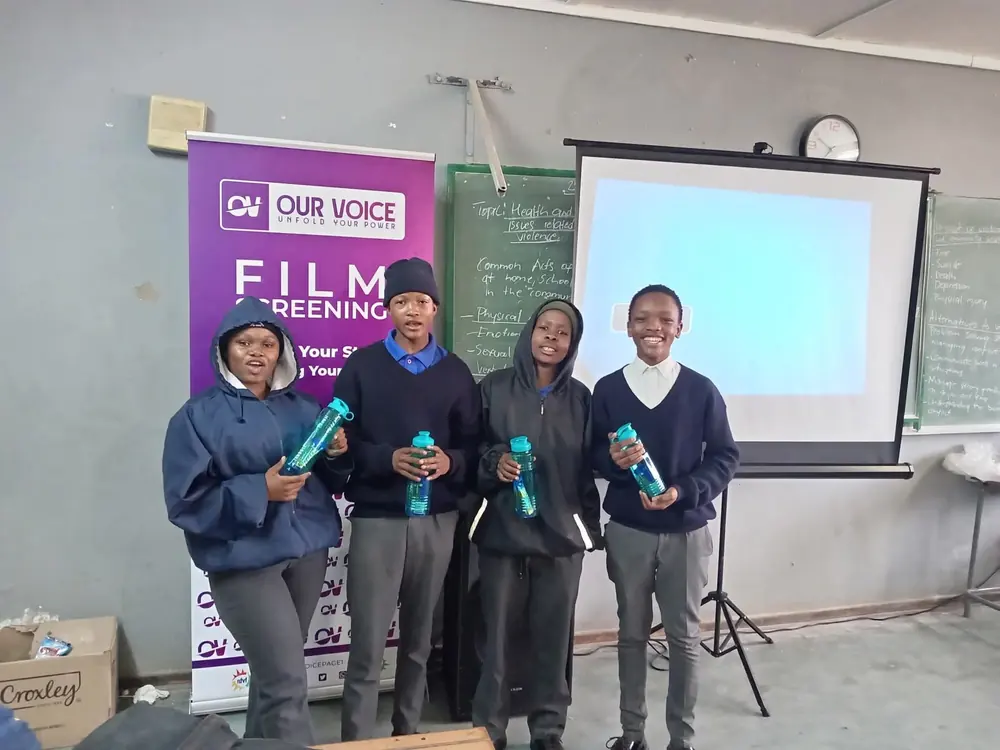 Learners at an Our Voice film screening in a classroom